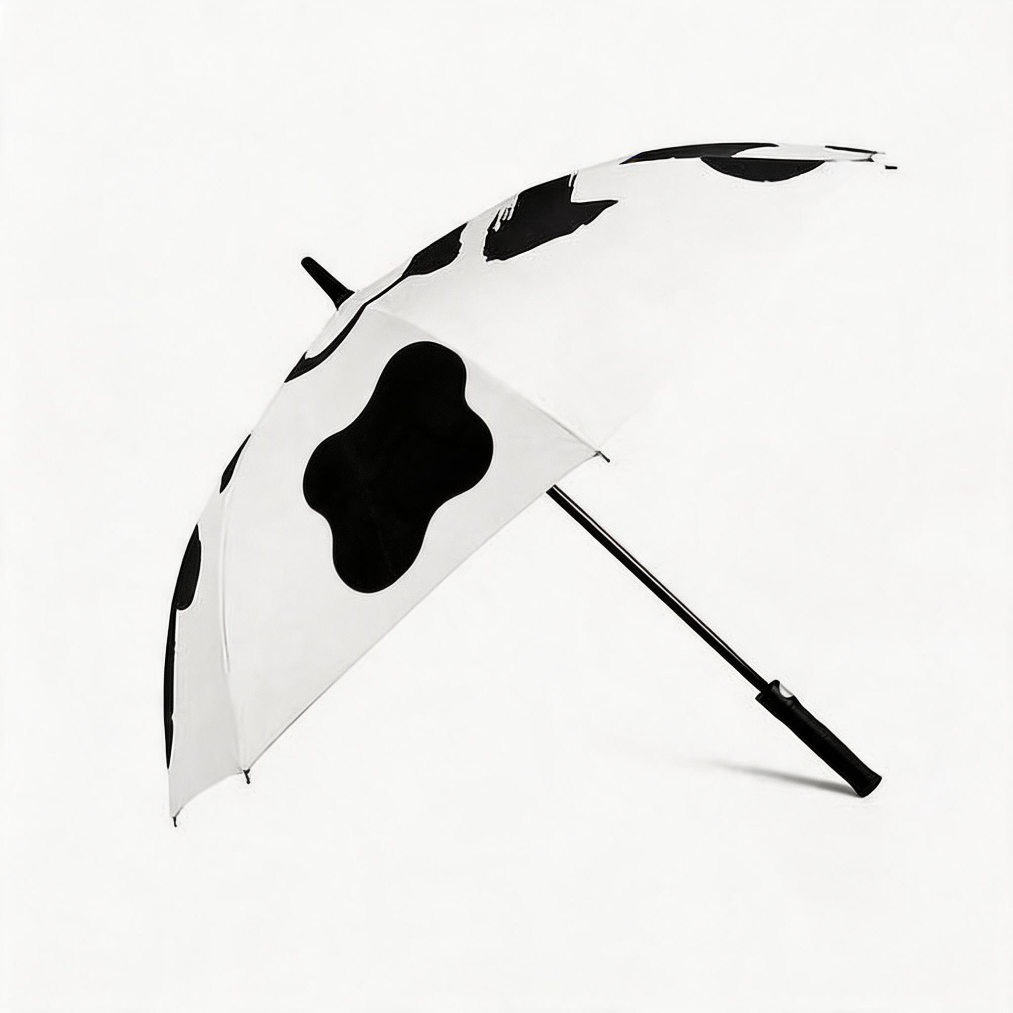 Cow print golf umbrella side product view