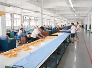 Custom umbrella fabric cutting workshop in Guangzhou umbrella factory