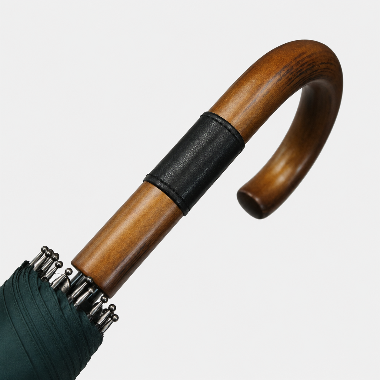 Solid wood hook handle detail on classic straight umbrella