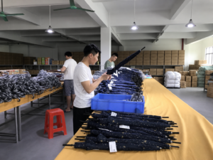 Custom umbrella packing workshop at a China umbrella factory