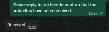 Chat excerpt showing a request to confirm receipt of the umbrellas and the reply Received