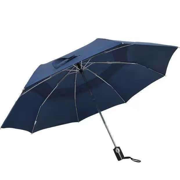 Side view of an open navy three-fold automatic open-and-close umbrella showing its canopy, ribs and handle