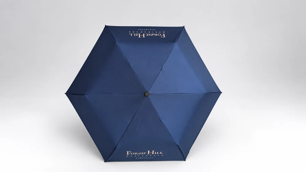 Navy six-rib automatic folding umbrella with light-colored logos on two opposite canopy panels