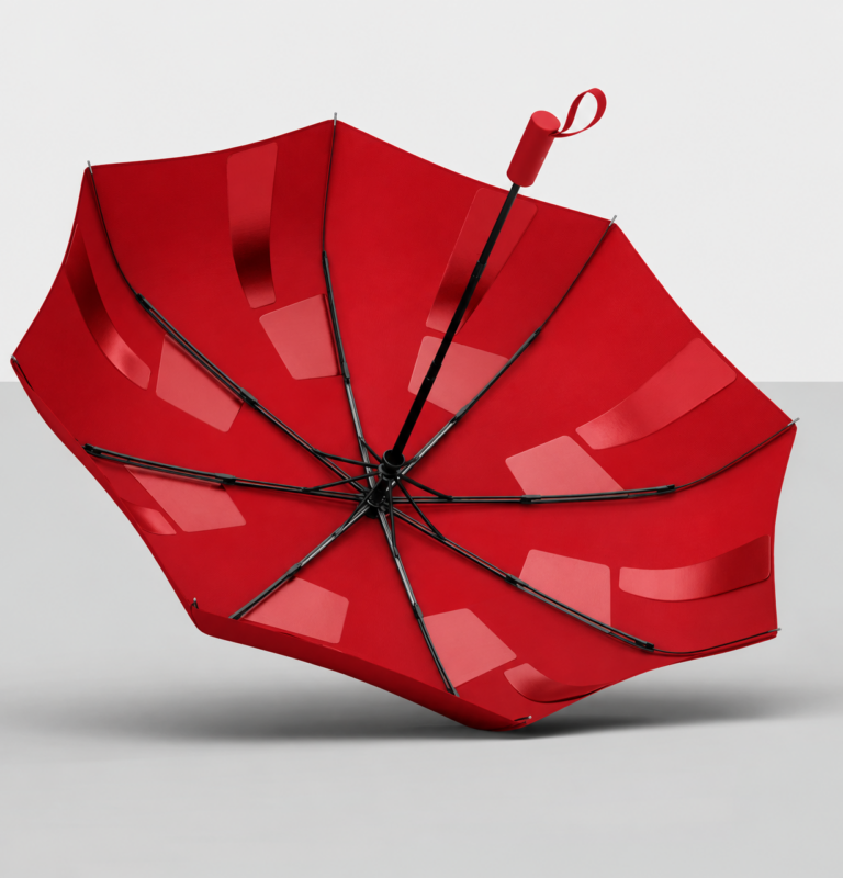 Underside of a red memory umbrella showing shaping patches and folding ribs